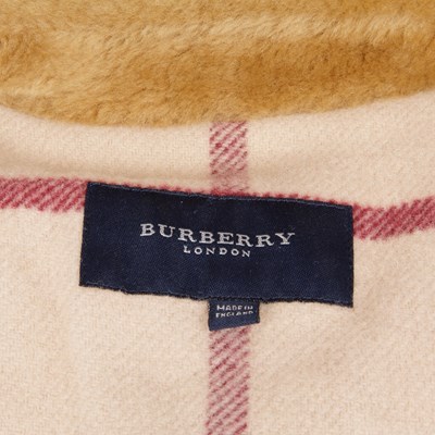 Lot 288 - Burberry, a denim gilet and striped top, the...