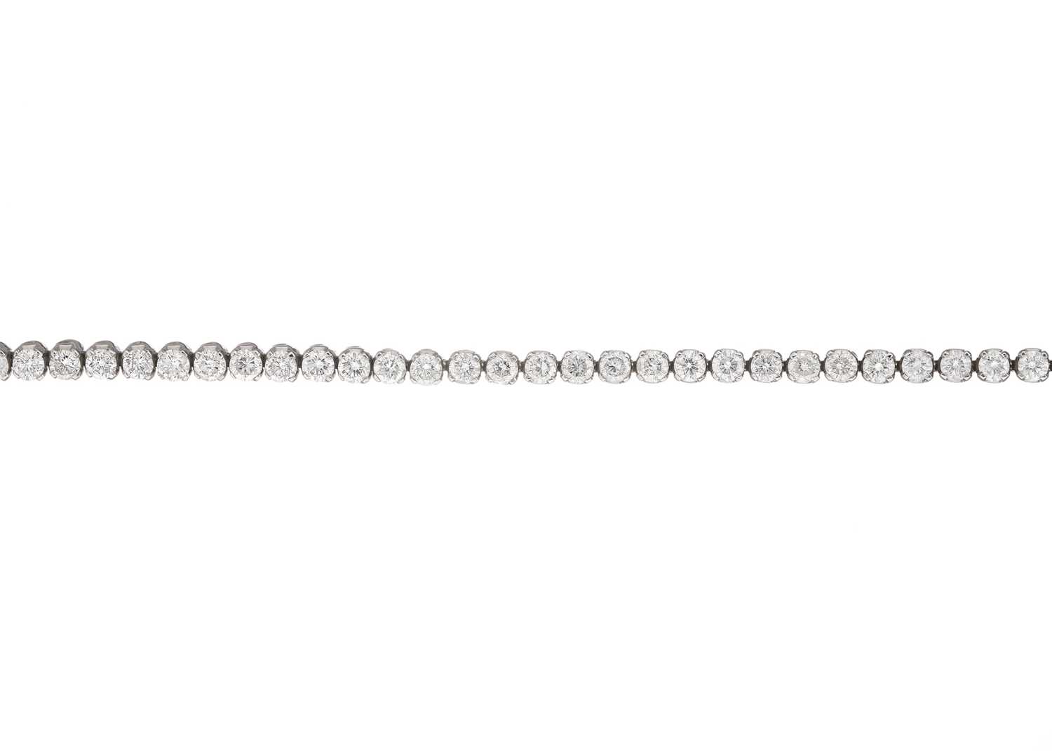 Lot 25 - An 18ct gold diamond line bracelet