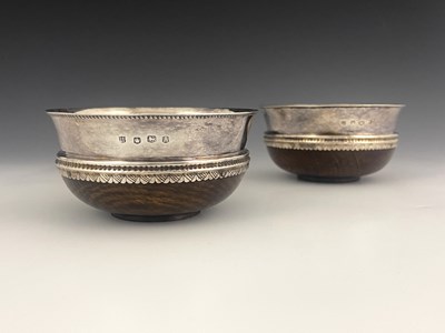 Lot 28 - A pair of George VI Arts and Crafts style...