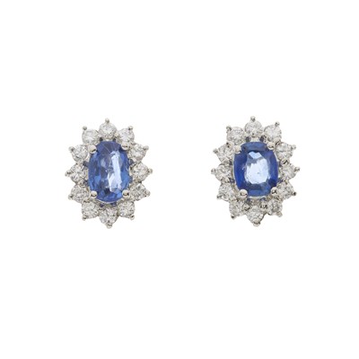 Lot 23 - A pair of gold, sapphire and diamond cluster stud earrings