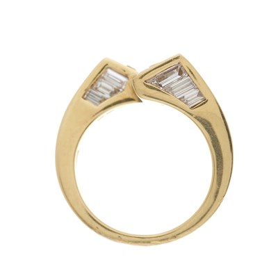 Lot 79 - Boucheron, an 18ct gold diamond crossover ring