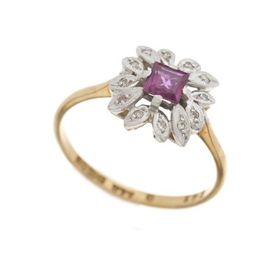 Lot 48 - A mid 20th century 18ct gold ruby and diamond dress ring