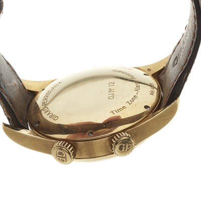 Lot 232 - Girard Perregaux, an 18ct gold Time Zone Traveller II Alarm wrist watch