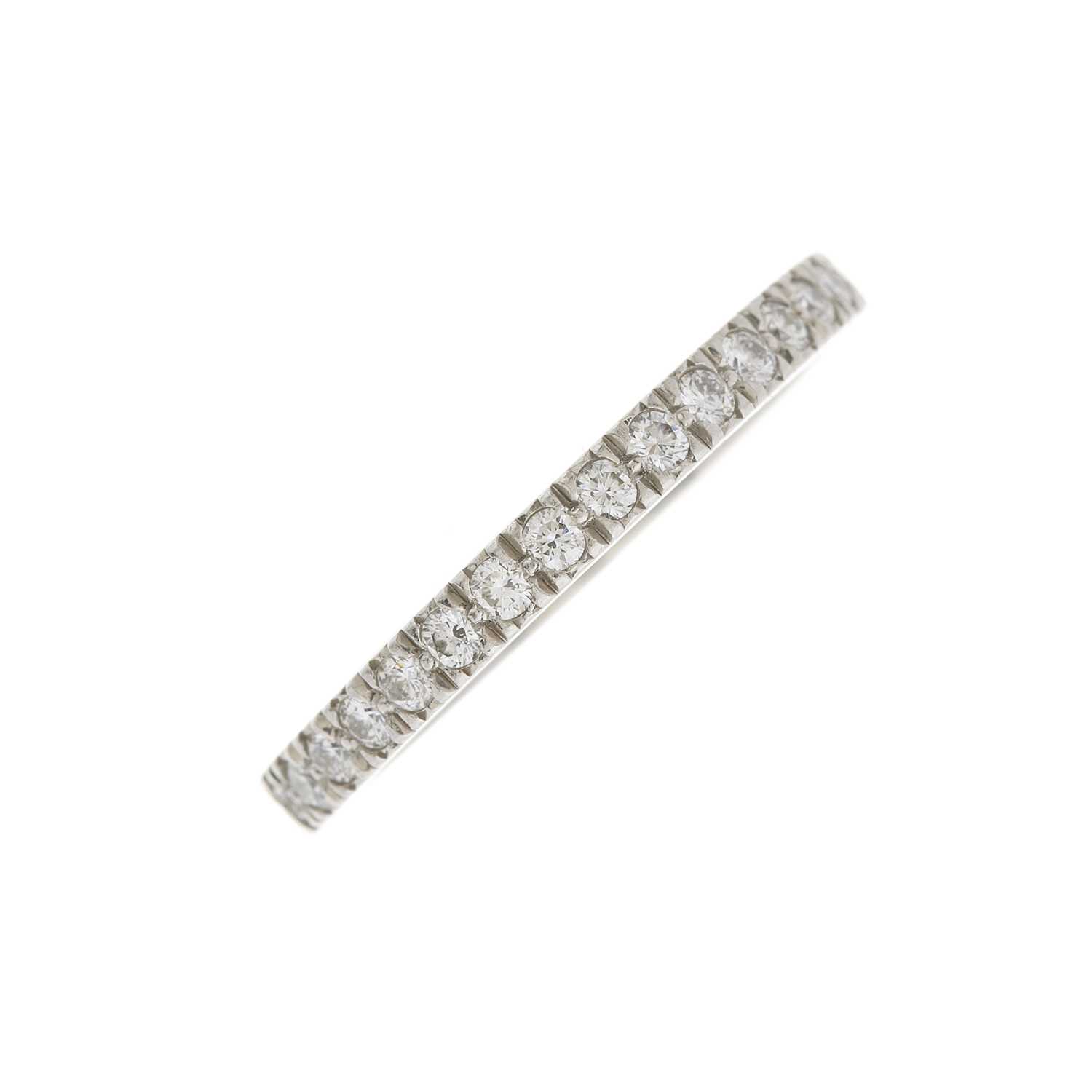 Lot 74 - Tiffany & Co, a platinum diamond half eternity ring