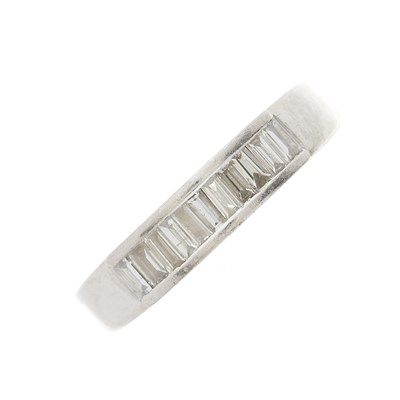 Lot 182 - A platinum diamond band ring