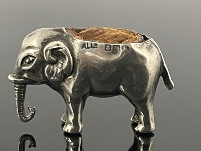 Lot 51 - An Edwardian novelty silver pin cushion,...