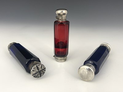 Lot 2 - A group of three cut glass and white metal...