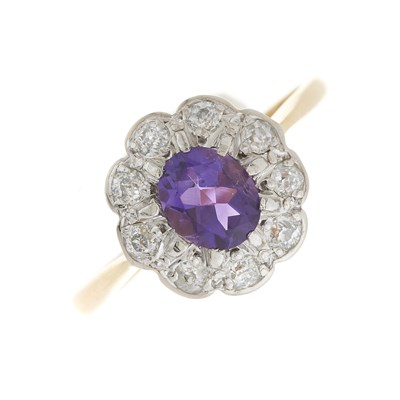 Lot 11 - An early 20th century 18ct gold amethyst and diamond cluster ring
