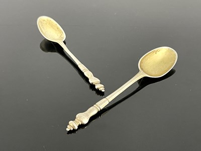Lot 83 - A pair of Queen Anne silver cast baluster...
