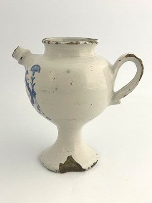 Lot 834 - An English Delft blue and white medicine...