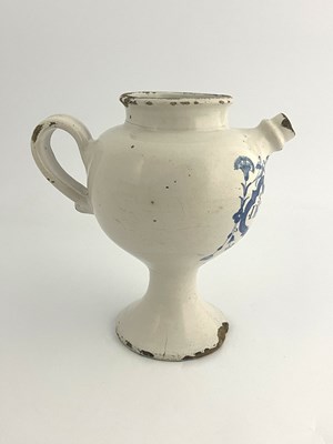 Lot 834 - An English Delft blue and white medicine...