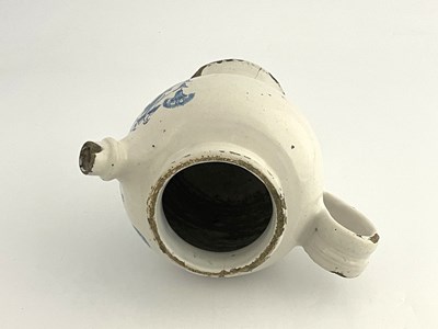 Lot 834 - An English Delft blue and white medicine...