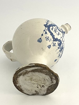 Lot 834 - An English Delft blue and white medicine...