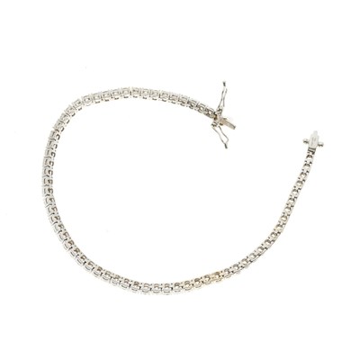 Lot 22 - An 18ct gold diamond line bracelet