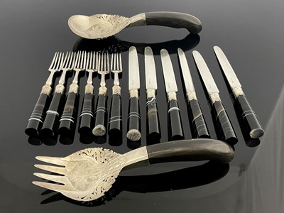 Lot 108 - A set of twelve nineteenth-century knives and...