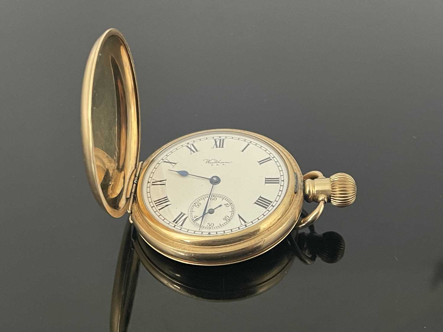 Lot 47 - A Waltham gold plated hunter pocket watch,...