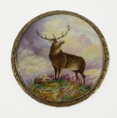 Lot 12 - A gold mounted porcelain plaque brooch,...