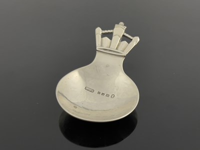 Lot 117 - R. E. Stone, an Art Deco silver caddy spoon,...
