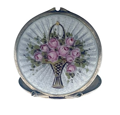 Lot 16 - A silver gilt and enamelled pendant locket,...