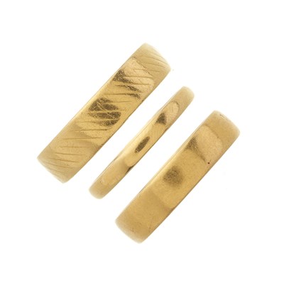 Lot 22 - Three 22ct gold band rings
