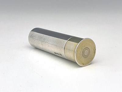 Lot 216 - An Elizabeth II silver novelty butt marker...