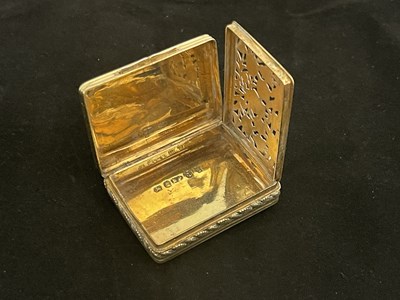 Lot 88 - A George III silver gilt vinaigrette, the top...