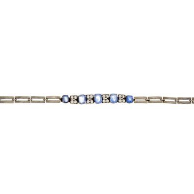 Lot 20 - An early 20th century silver sapphire panel bracelet
