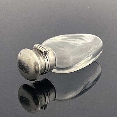 Lot 23 - A Victorian silver-mounted rock crystal scent...