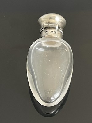 Lot 23 - A Victorian silver-mounted rock crystal scent...