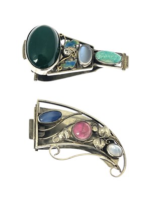 Lot 30 - Two white metal Arts & Crafts style clips,...