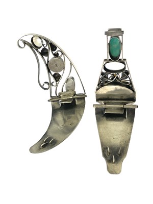Lot 30 - Two white metal Arts & Crafts style clips,...