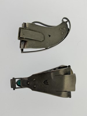 Lot 30 - Two white metal Arts & Crafts style clips,...