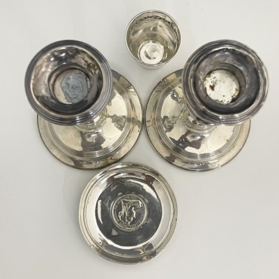 Lot 13 - A pair of George V silver candlesticks, each...