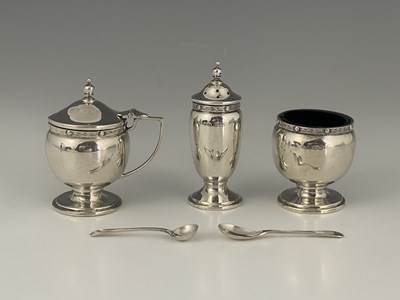 Lot 14 - A George VI silver condiment set, in the...