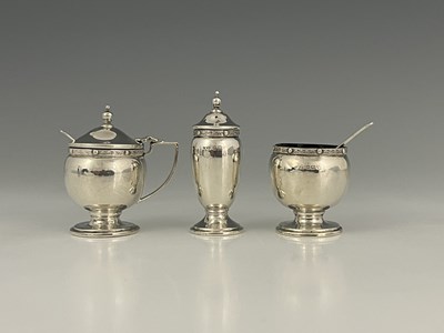 Lot 14 - A George VI silver condiment set, in the...