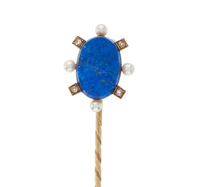 Lot 2 - A late 19th century gold lapis lazuli cabochon...
