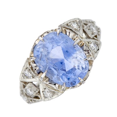 Lot 65 - An Art Deco platinum cushion-shape sapphire...